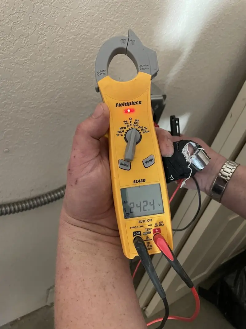 Voltage testing with clamp meter during Generator Installation in Plattsmouth